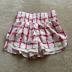 white and pink athletic shorts